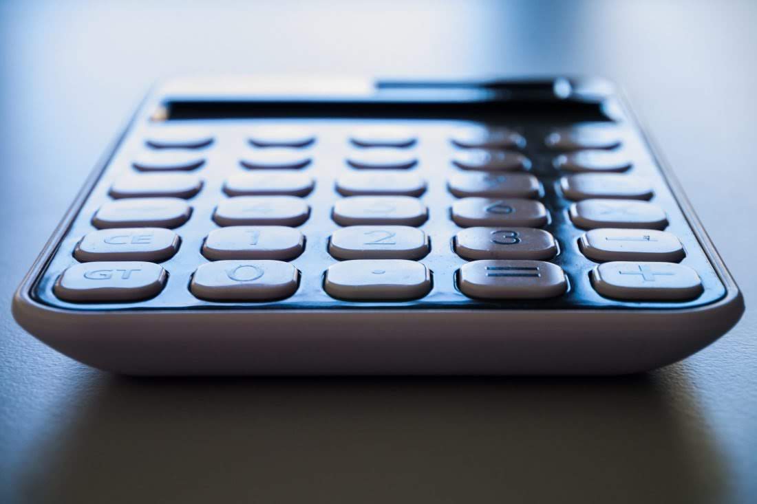 calculator representing a daughter hoping to redistribute assets under her mother's will