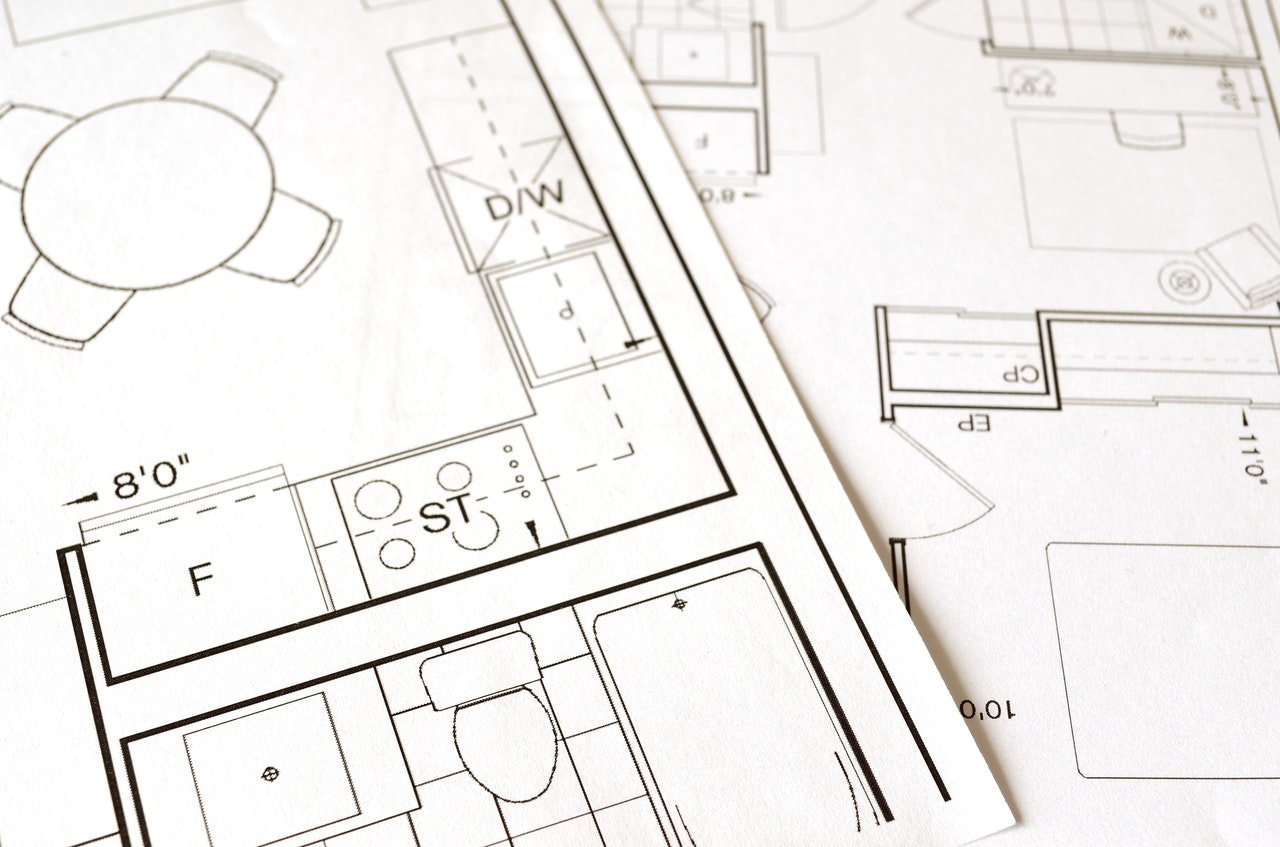 Blueprints representing a penalty clause in a land purchase agreement that was found to be unconscionable