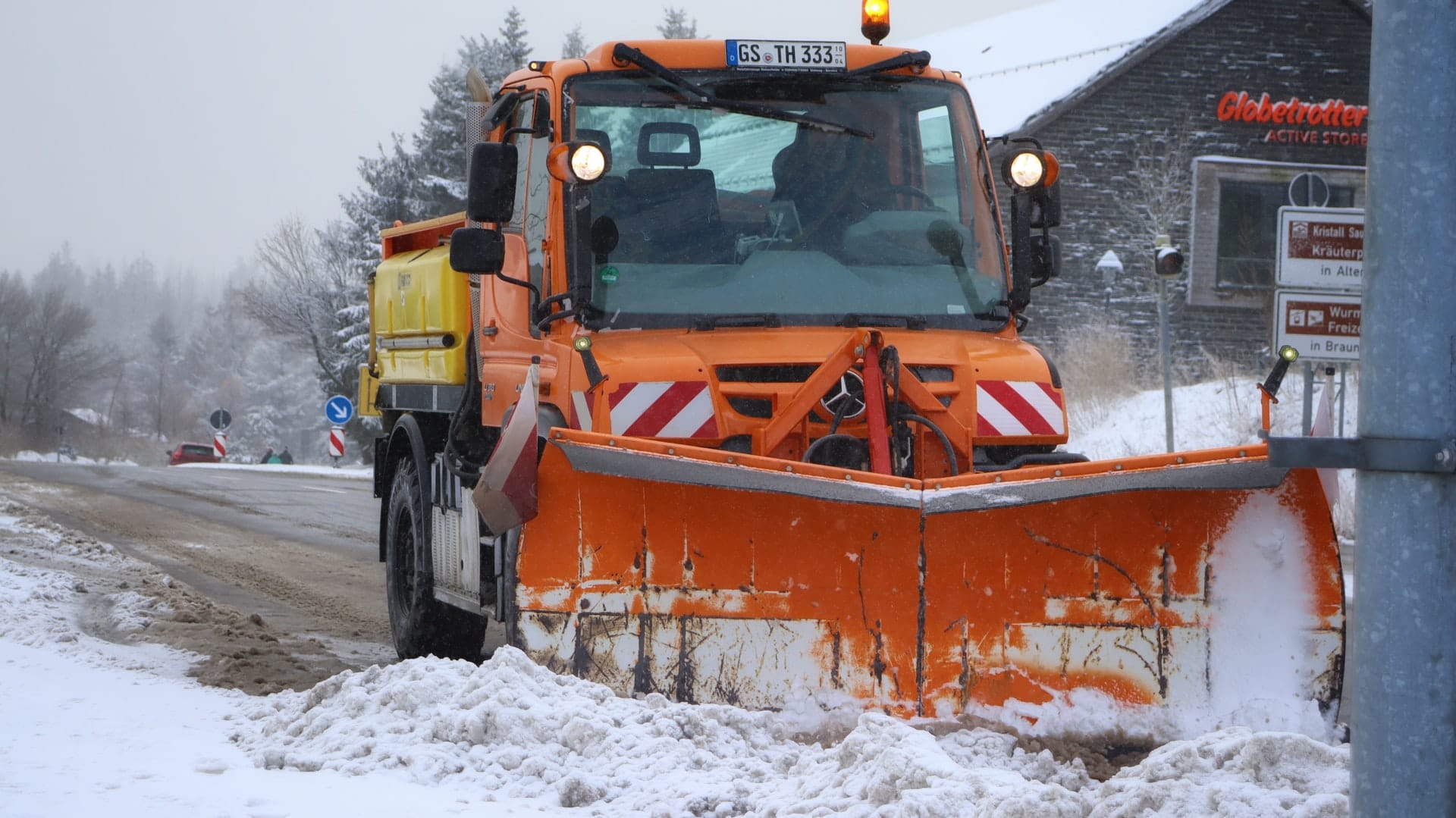 Snow removal on city street